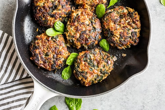 Cooked turkey burgers all browned with crispy edges!