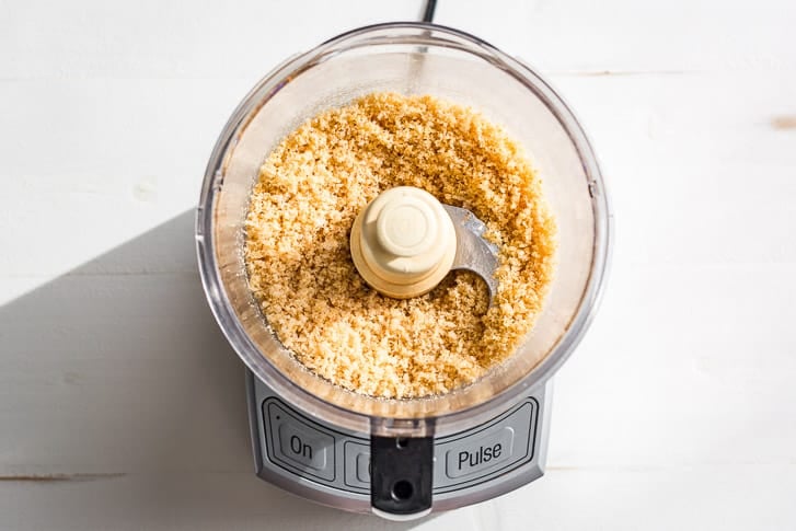 Pork rinds ground into 'panko' like bread crumbs in a food processor.