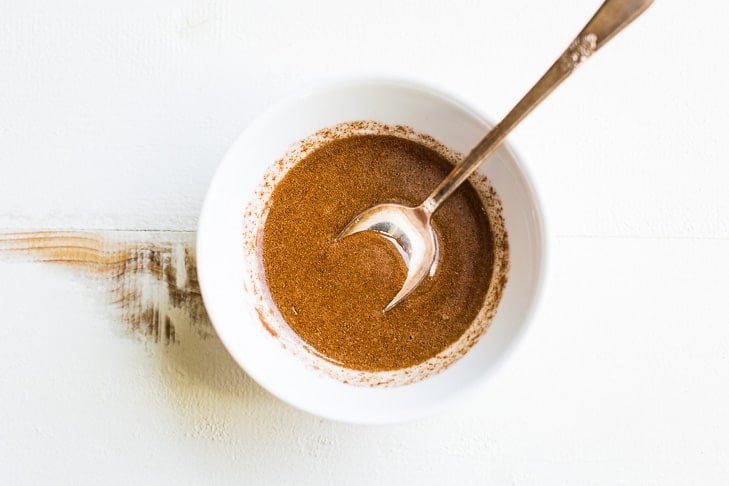 Mixing together the cinnamon glaze!