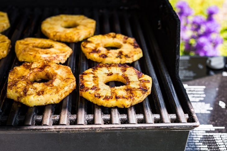 Grilling the cinnamon pineapple over medium heat!