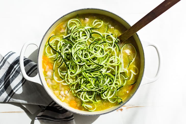 The heat of the finished soup perfectly cooks the zucchini noodles!