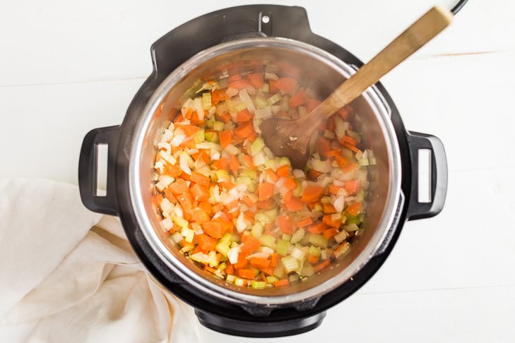 Sautéed carrots, celery, and onion in the Instant Pot.