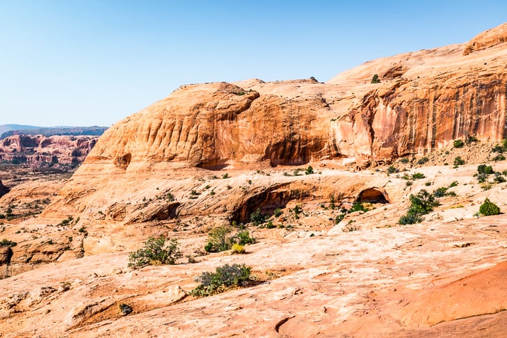 Views looking back at the trail leading to Corona Arch.