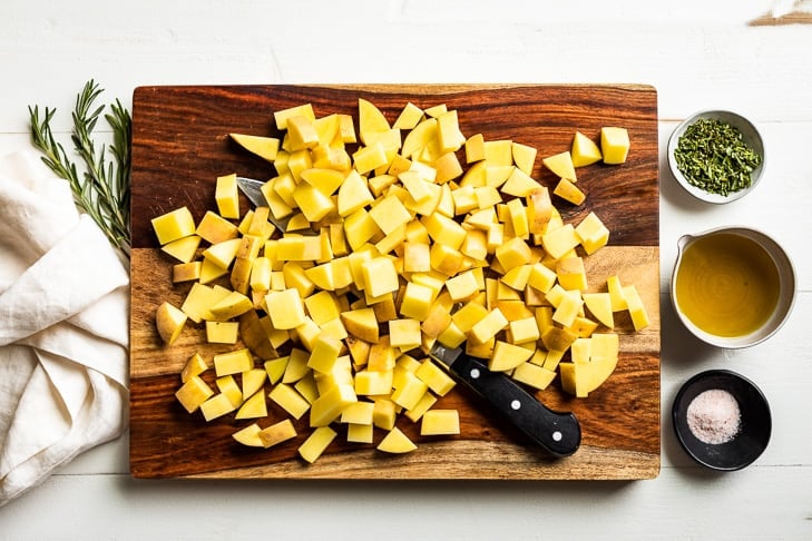 All of the ingredients prepped and the potatoes diced and ready to make the best rosemary potatoes.