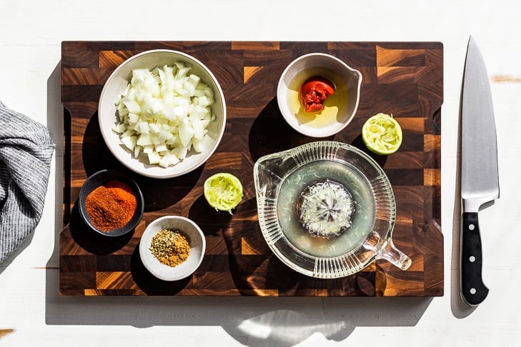 All the ingredients for this recipe on a wooden cutting board.