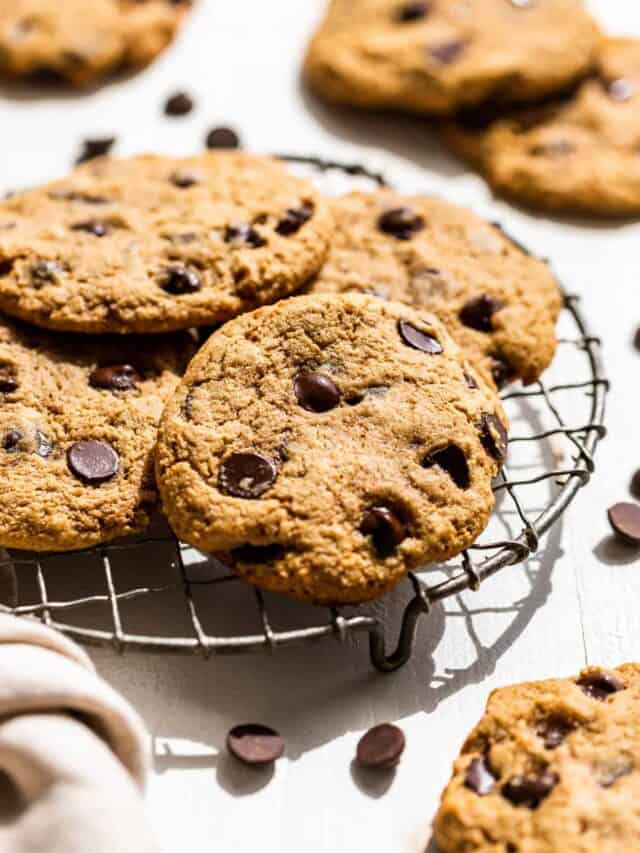 Chocolate Chip Cookies on a round wire cooling rack.