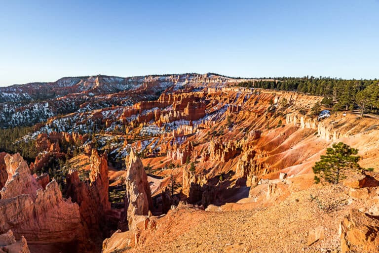 The view at Sunrise Overlook Point at Bryce Canyon National Park with early morning light on the orange hoodoos.