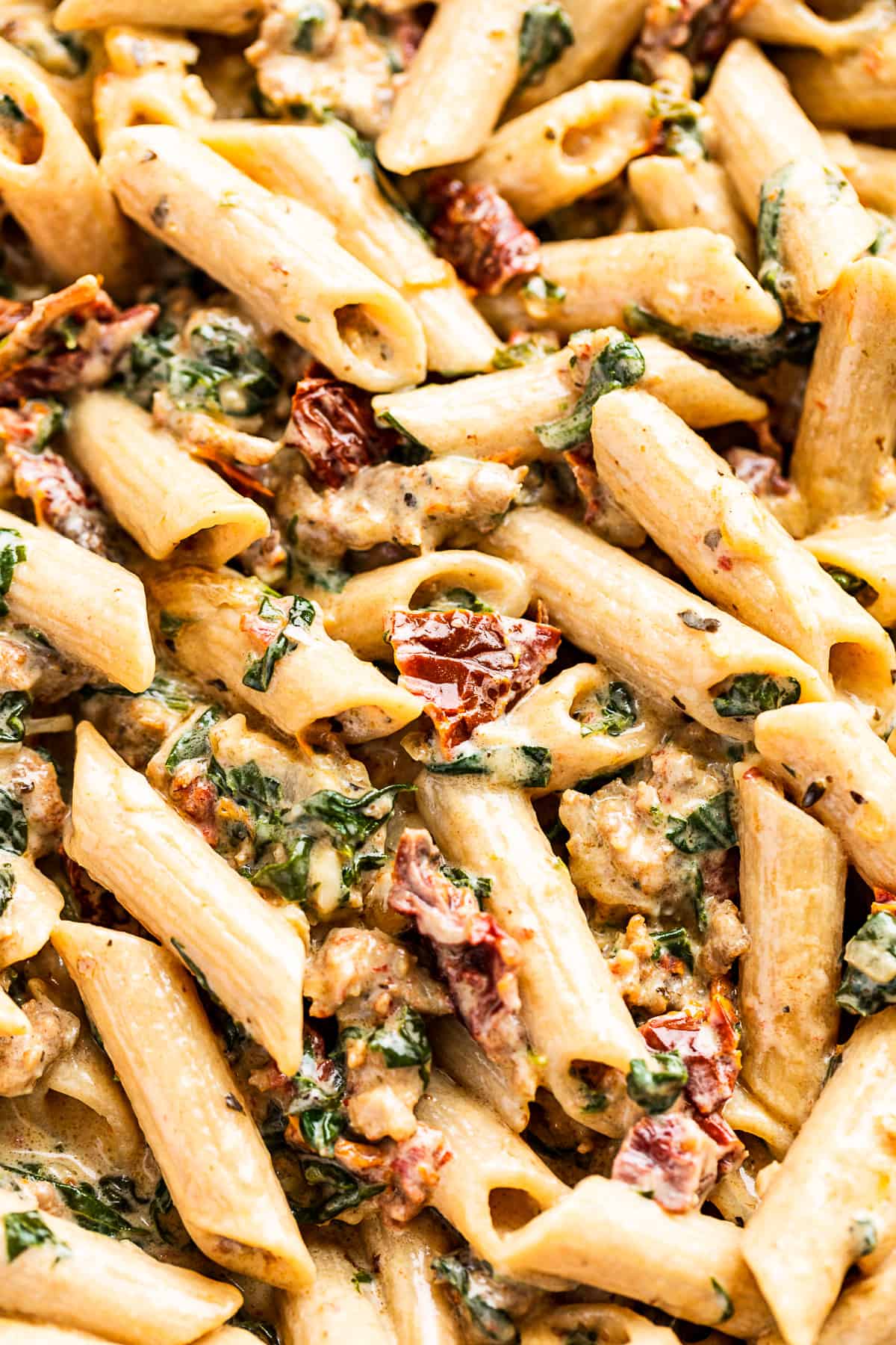 Close up view of the Tuscan Pasta made with penne instead of fettucine.