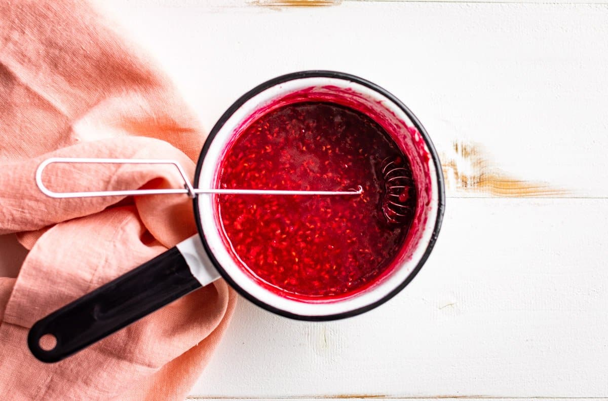 The thickened raspberry filling with the coconut oil mixed in.