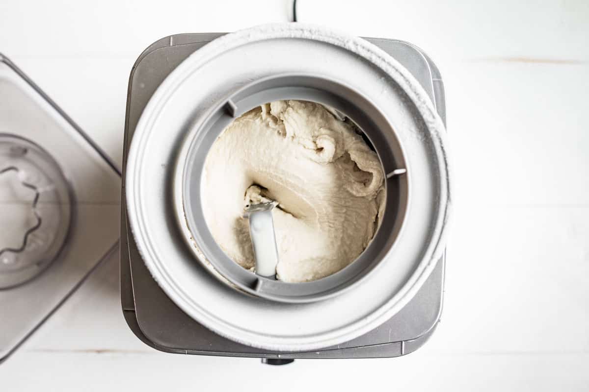 Coconut Ice Cream in a soft serve texture in the ice cream machine.