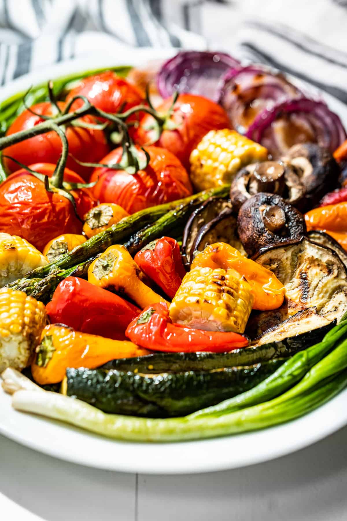 Front view of Grilled Vegetables on a large white platter.