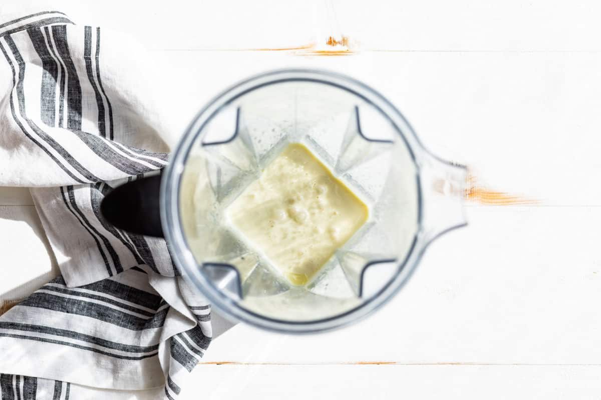 Base for ranch dressing in a blender container.