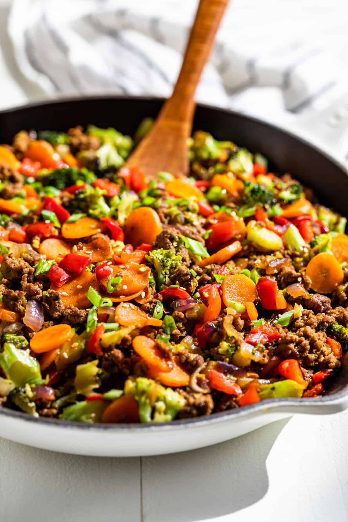 Ground Beef Stir Fry with Stir Fry Sauce in a large white skillet.