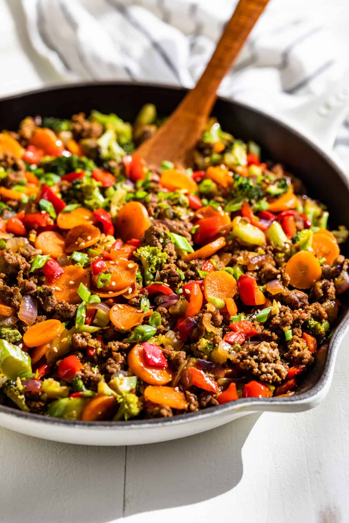 Ground Beef Stir Fry with Stir Fry Sauce in a large white skillet.