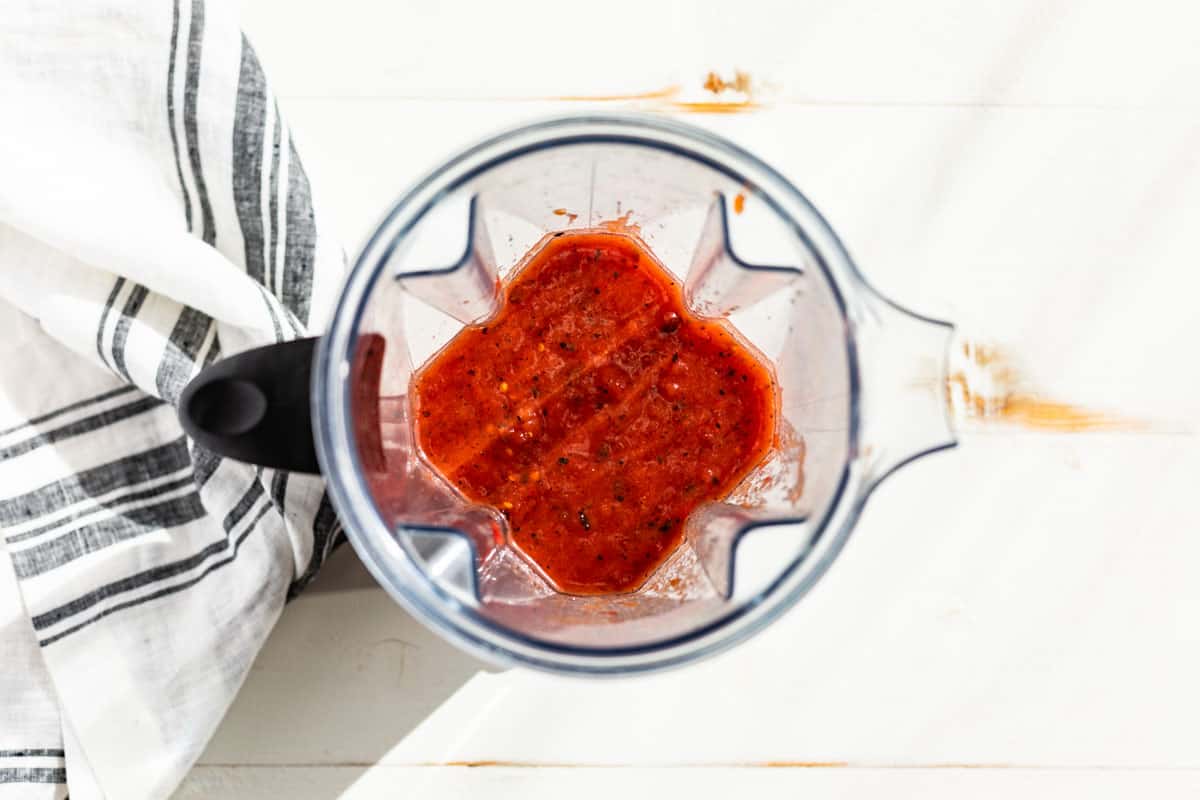 Blended tomatoes in a blender container.