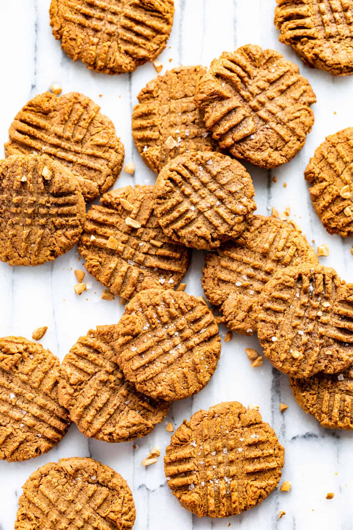 Straight down view of Peanut Butter Cookies on a marble background.