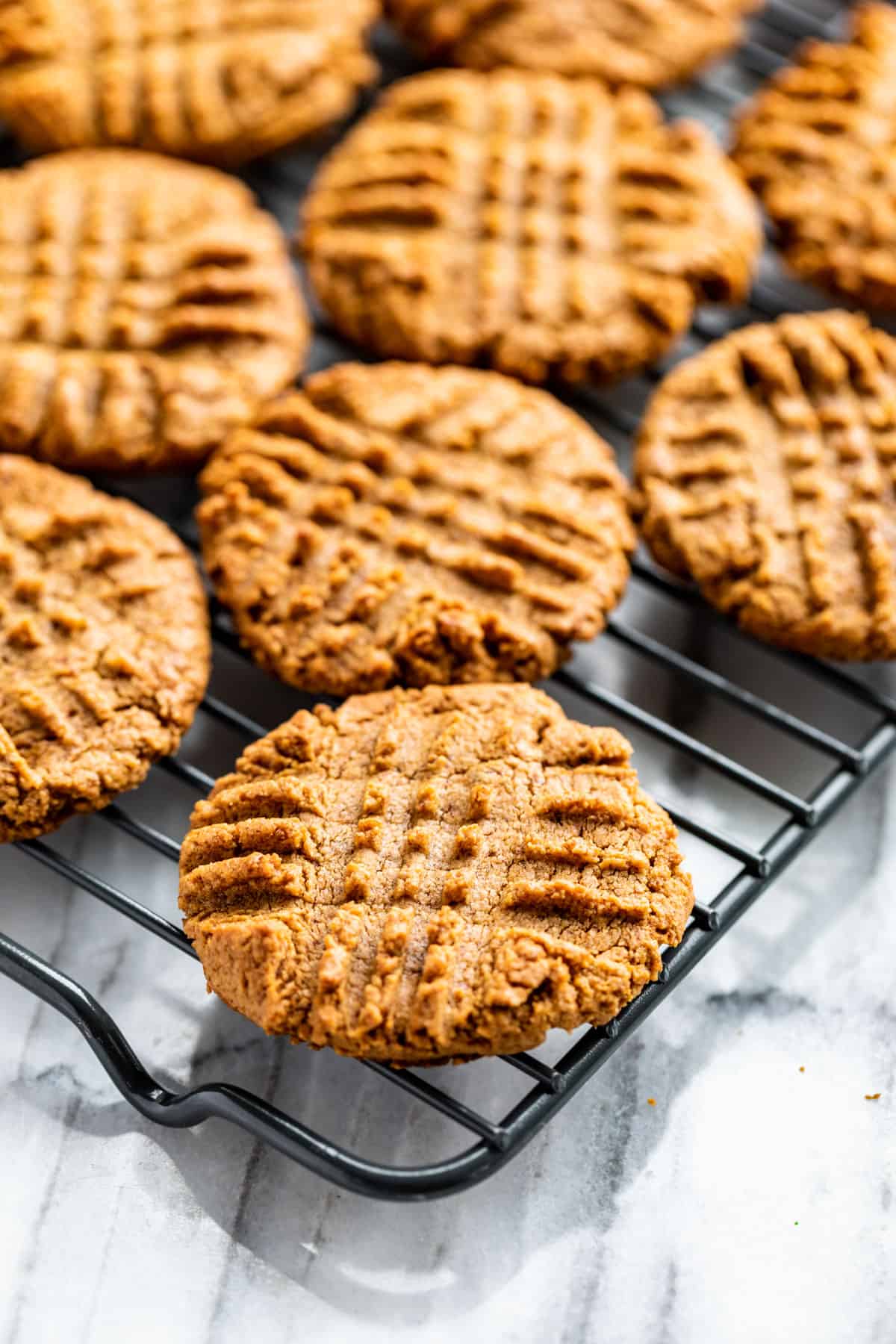 Cooling the 3 Ingredient Peanut Butter Cookies on a cooling rack.