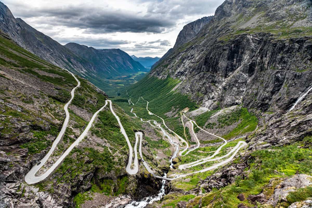 Looking down on the switchbacking road called Trollstigen that winds down the side of the mountain into the valley below.