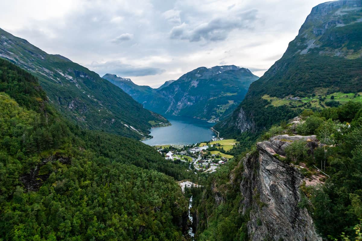 The famous view of Geiranger fjord in Norway with mountains in the background.