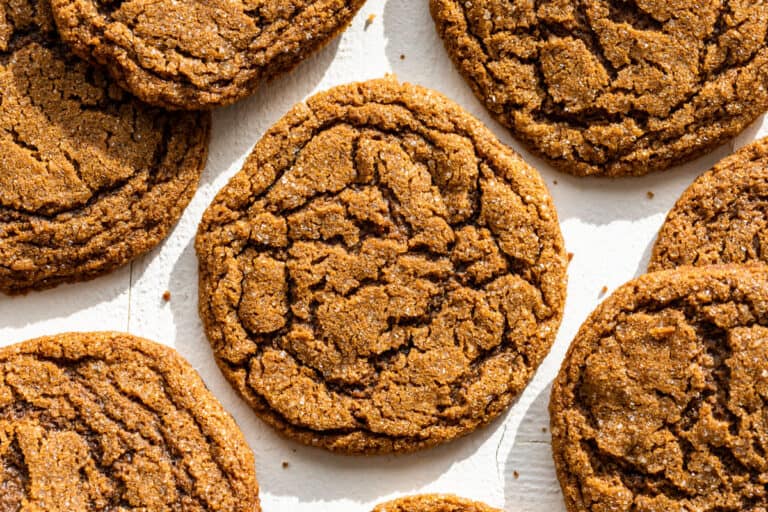 Straight down view of Molasses Ginger Cookies on a white background.