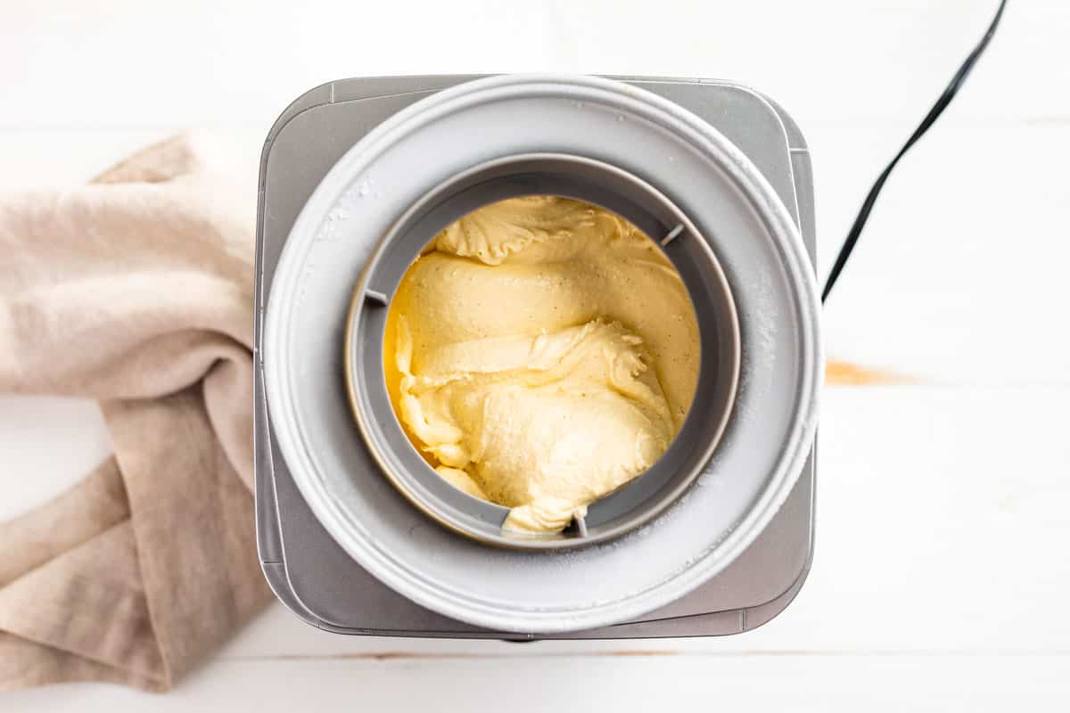 Vanilla Ice Cream in the ice cream machine at a soft serve texture.