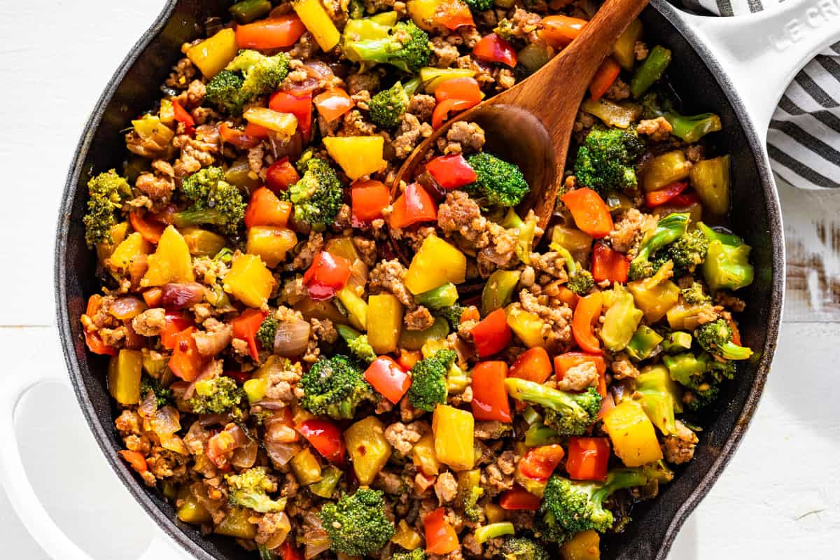 Straight down view of Ground Pork Stir Fry in a white skillet.