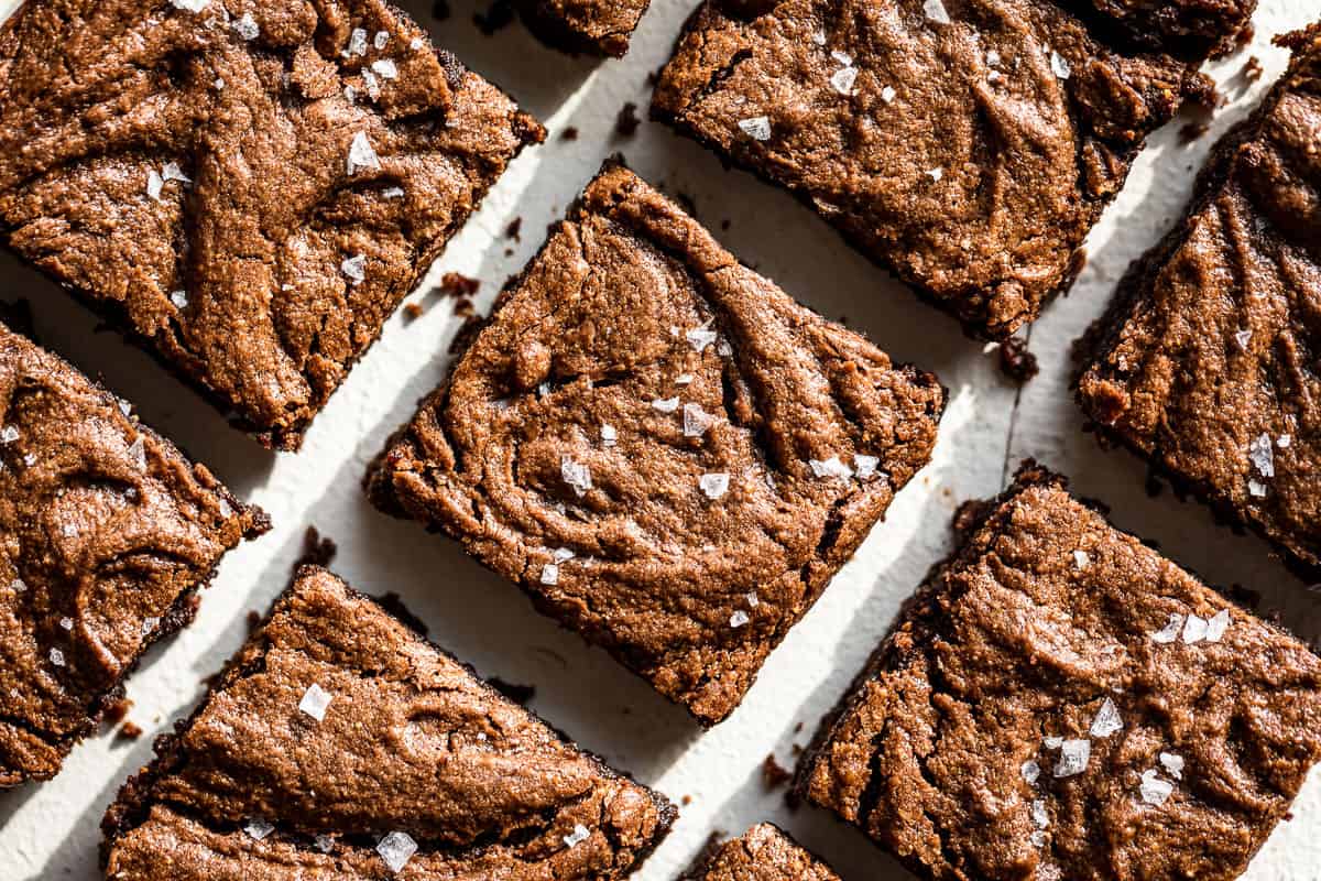 The Best Flourless Brownies sliced up and sprinkled with sea salt.