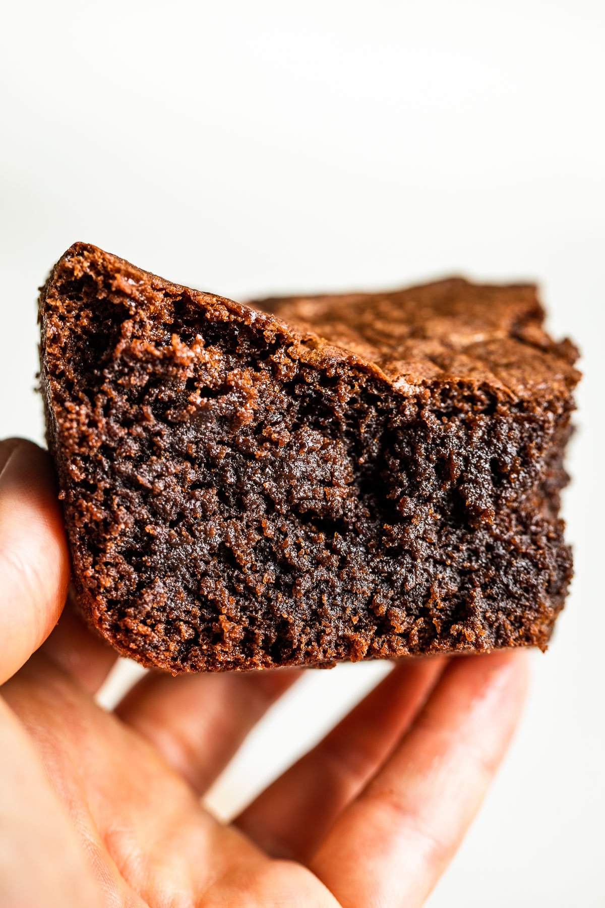 A texture shot of the fudgy side of the flourless brownies.