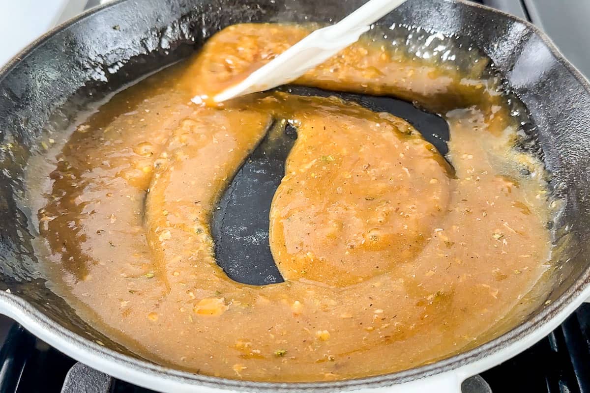 Making a pan sauce with the pork juices.