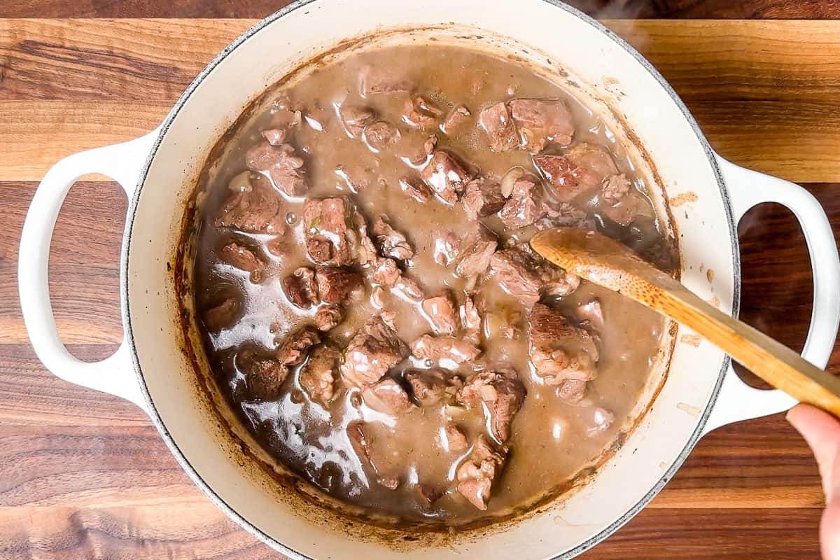 The texture of the stew after the first hour of cooking in the oven.