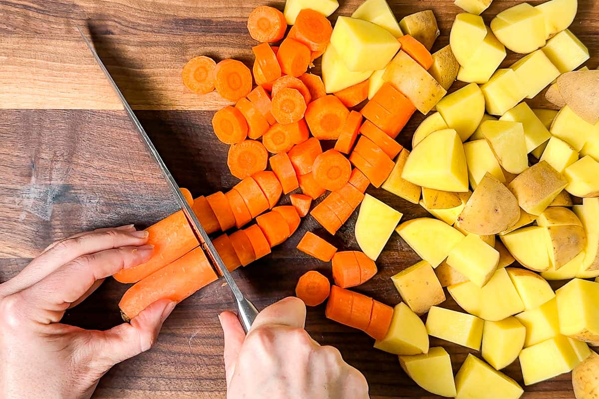 Cutting up the carrots and potatoes for the beef stew.