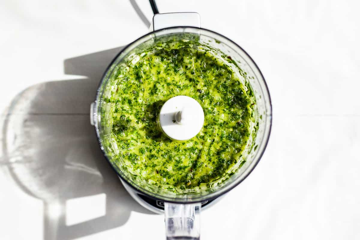 Making the cilantro chimichurri in a small food processor.