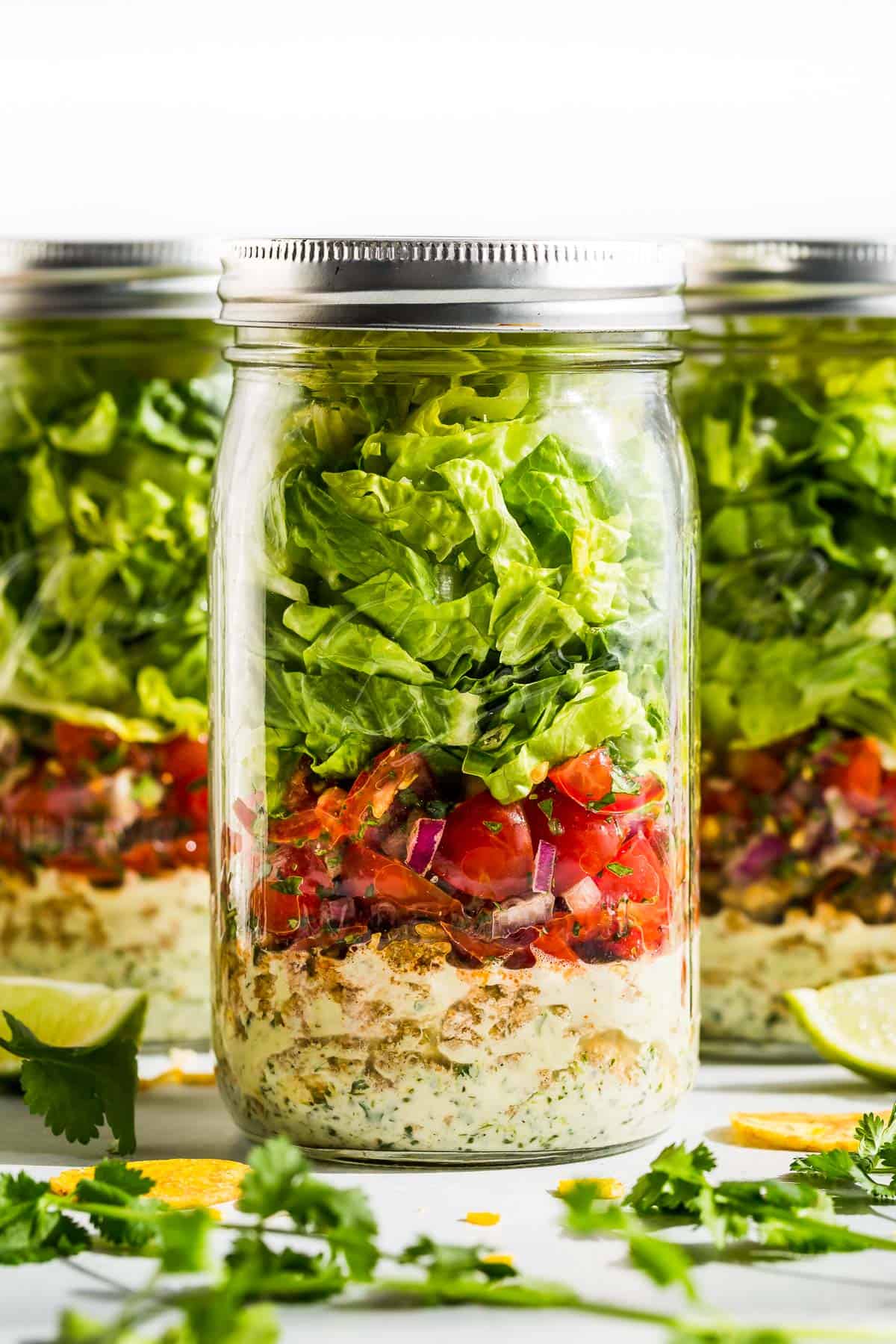 Turkey Taco Salad layered in mason jars.