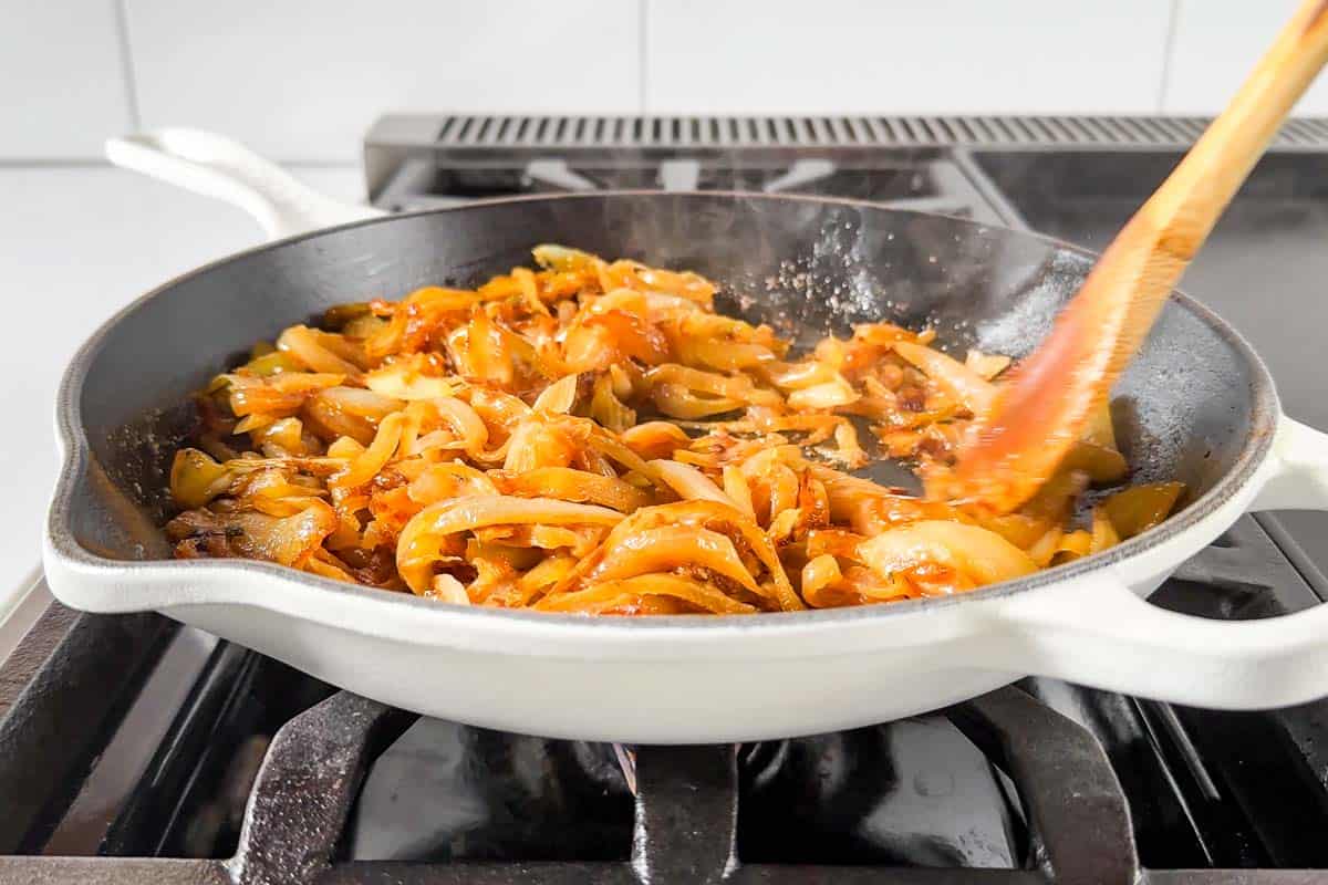 The final stages of cooking the onions where they've turned dark brown.