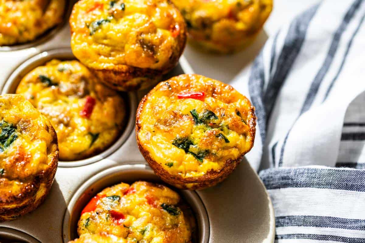 Finished Sausage Egg muffins in a muffin tin.